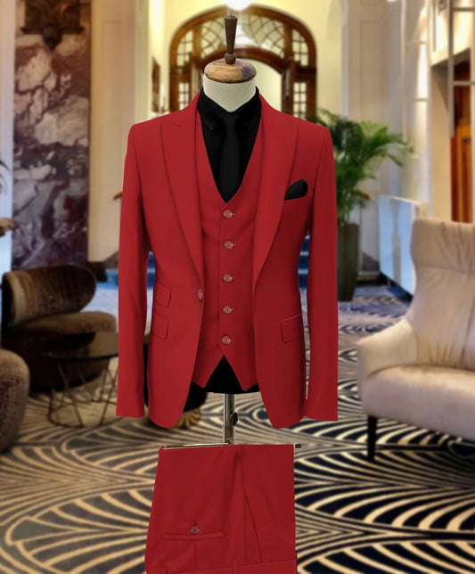 Red suit on a mannequin against an indoor background